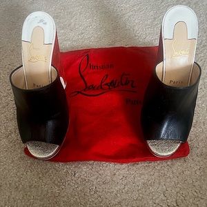 Christian Louboutin platform mules. Size fits like 5.5-6
